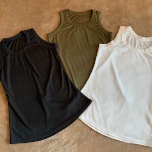 3 ribbed tanks. White, black, olive